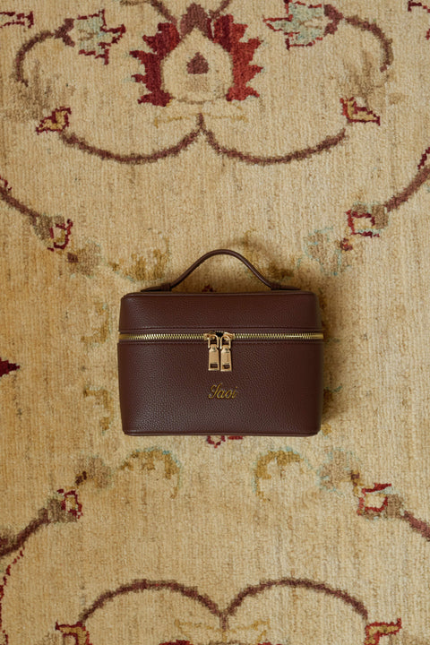 Brown handbag with gold accents